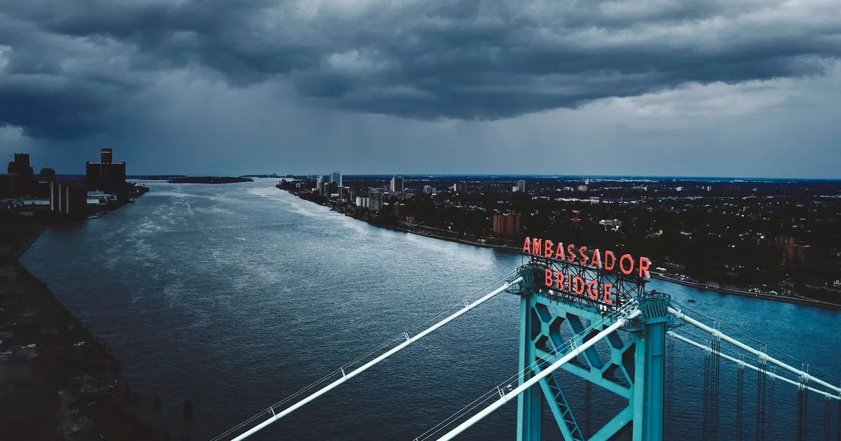 Windsor Ontario skyline on the Detroit River, where payday loans Windsor borrowers take out are capped at $14 per $100
